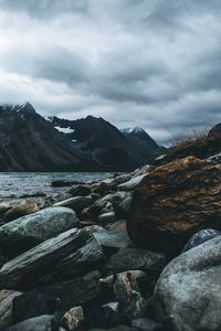 Preview wallpaper mountain, stones, water, lake, fog, overcast