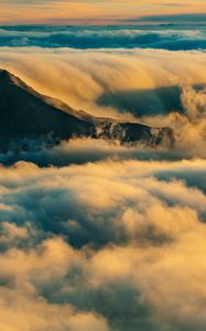 Preview wallpaper mountain, summit, clouds, haleakala, united states