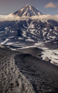 Preview wallpaper mountain, summit, clouds, kamchatka peninsula, russia
