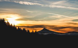 Preview wallpaper mountain, sunset, sky, clouds, trees, landscape, twilight