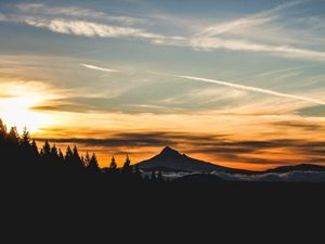 Preview wallpaper mountain, sunset, sky, clouds, trees, landscape, twilight