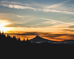 Preview wallpaper mountain, sunset, sky, clouds, trees, landscape, twilight