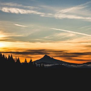 Preview wallpaper mountain, sunset, sky, clouds, trees, landscape, twilight