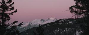 Preview wallpaper mountain, sunset, sky, trees, snowy, peak