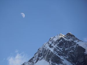 Preview wallpaper mountain, top, sky, moon, snow