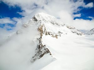 Preview wallpaper mountain, top, snow, clouds, mountain landscape