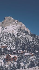 Preview wallpaper mountain, top, snow, houses, recreation