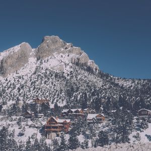 Preview wallpaper mountain, top, snow, houses, recreation