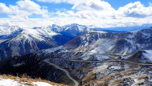 Preview wallpaper mountain tops, snow, road, bends, height