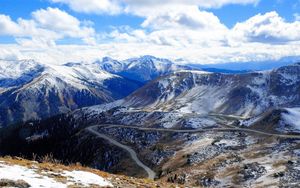 Preview wallpaper mountain tops, snow, road, bends, height