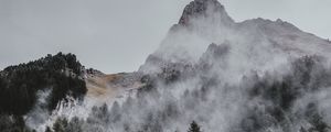 Preview wallpaper mountain, trees, fog, aerial view, sky, peak