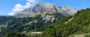 Preview wallpaper mountain, trees, house, road, nature, landscape