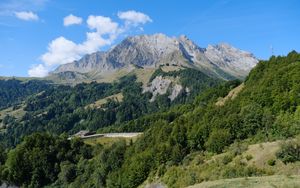 Preview wallpaper mountain, trees, house, road, nature, landscape