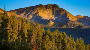 Preview wallpaper mountain, trees, slope, light, landscape