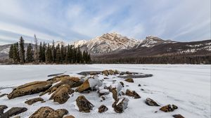 Preview wallpaper mountain, trees, snow, lake, stones