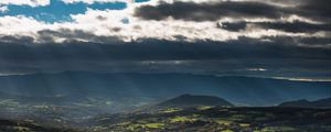 Preview wallpaper mountain, valley, clouds, overcast, village