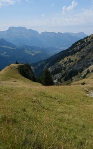 Preview wallpaper mountain, valley, slope, grass, greens, landscape