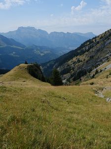 Preview wallpaper mountain, valley, slope, grass, greens, landscape