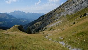 Preview wallpaper mountain, valley, slope, grass, greens, landscape
