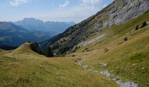 Preview wallpaper mountain, valley, slope, grass, greens, landscape