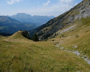 Preview wallpaper mountain, valley, slope, grass, greens, landscape