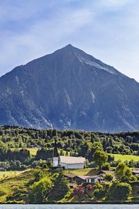 Preview wallpaper mountain, valley, trees, houses, nature