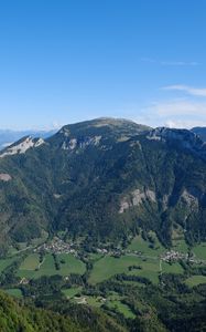 Preview wallpaper mountain, valley, trees, houses, nature, sky