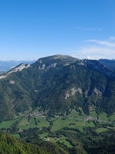 Preview wallpaper mountain, valley, trees, houses, nature, sky