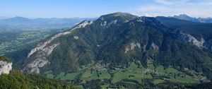 Preview wallpaper mountain, valley, trees, houses, nature, sky