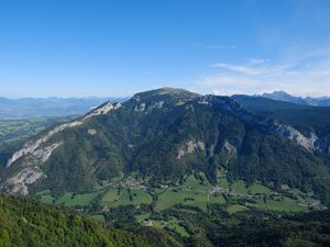 Preview wallpaper mountain, valley, trees, houses, nature, sky