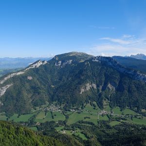 Preview wallpaper mountain, valley, trees, houses, nature, sky