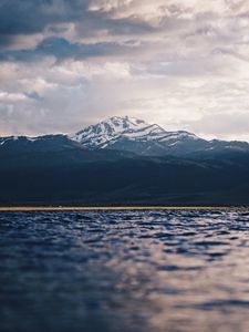 Preview wallpaper mountain, water, blur, peaks, clouds