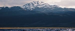 Preview wallpaper mountain, water, blur, peaks, clouds