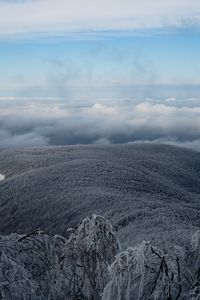 Preview wallpaper mountain, winter, clouds, frost, peak, sky