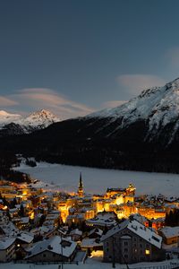 Preview wallpaper mountain, winter, village, snow, light, switzerland