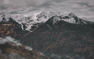 Preview wallpaper mountains, aerial view, fog, trees, sky, peaks