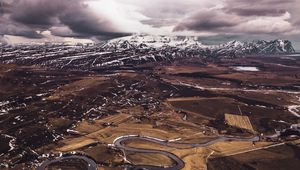 Preview wallpaper mountains, aerial view, road, snow, winter, iceland