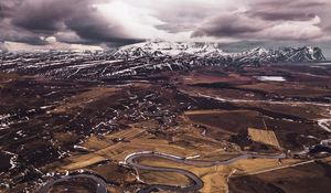 Preview wallpaper mountains, aerial view, road, snow, winter, iceland