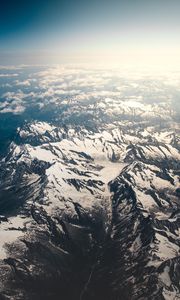 Preview wallpaper mountains, aerial view, snowy, peaks, clouds, sky