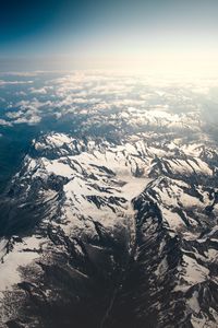 Preview wallpaper mountains, aerial view, snowy, peaks, clouds, sky