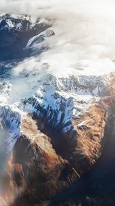 Preview wallpaper mountains, aerial view, tops, snow, clouds