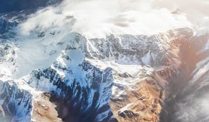 Preview wallpaper mountains, aerial view, tops, snow, clouds