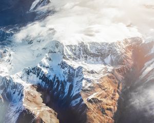 Preview wallpaper mountains, aerial view, tops, snow, clouds