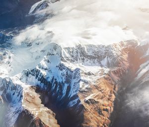 Preview wallpaper mountains, aerial view, tops, snow, clouds