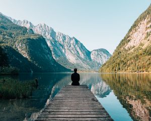 Preview wallpaper mountains, alone, lake, pier, solitude