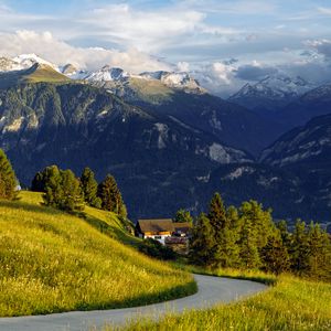 Preview wallpaper mountains, alps, meadow, road, forest, trees, nature