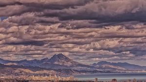 Preview wallpaper mountains, bay, city, clouds