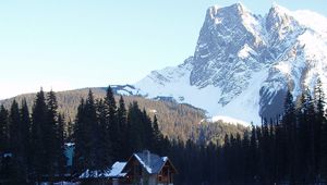 Preview wallpaper mountains, bridge, small house, structure, top, lake, trees, fur-trees