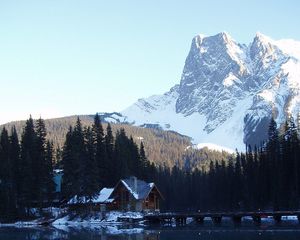 Preview wallpaper mountains, bridge, small house, structure, top, lake, trees, fur-trees