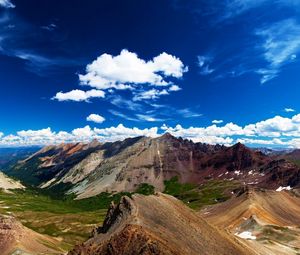 Preview wallpaper mountains, brightly, lowland, height, bottom, clouds, sky, freedom, freshness